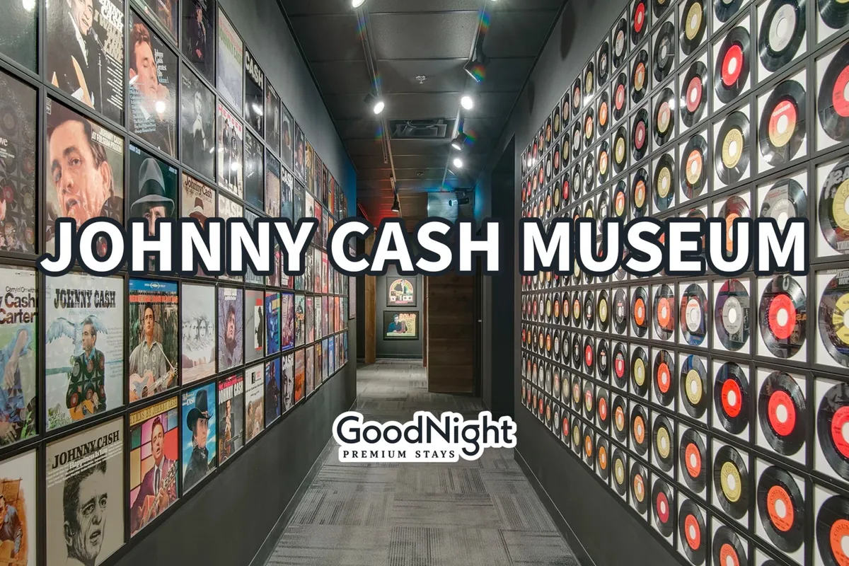 An interior shot featuring museum signage, a wall of album covers and vinyl records, immersing visitors in the history and legacy of country music. The inviting display encourages learning and reflection on legendary artists, specifically tying into Nashville’s iconic music museums like the Johnny Cash Museum.